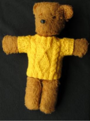 Cable knitting teddy bear jumper example